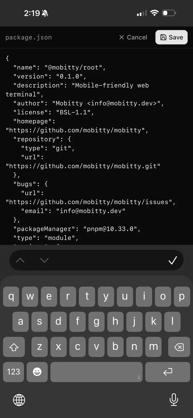 Browser-based file editor showing package.json with Cancel and Save buttons